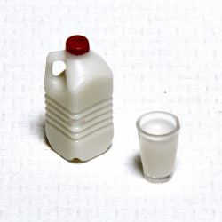 Maitopullo ja lasillinen maitoa