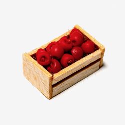 Punaisia omenoita puulaatikossa