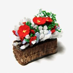 Kukkia parvekelaatikossa, puna-valkoinen
